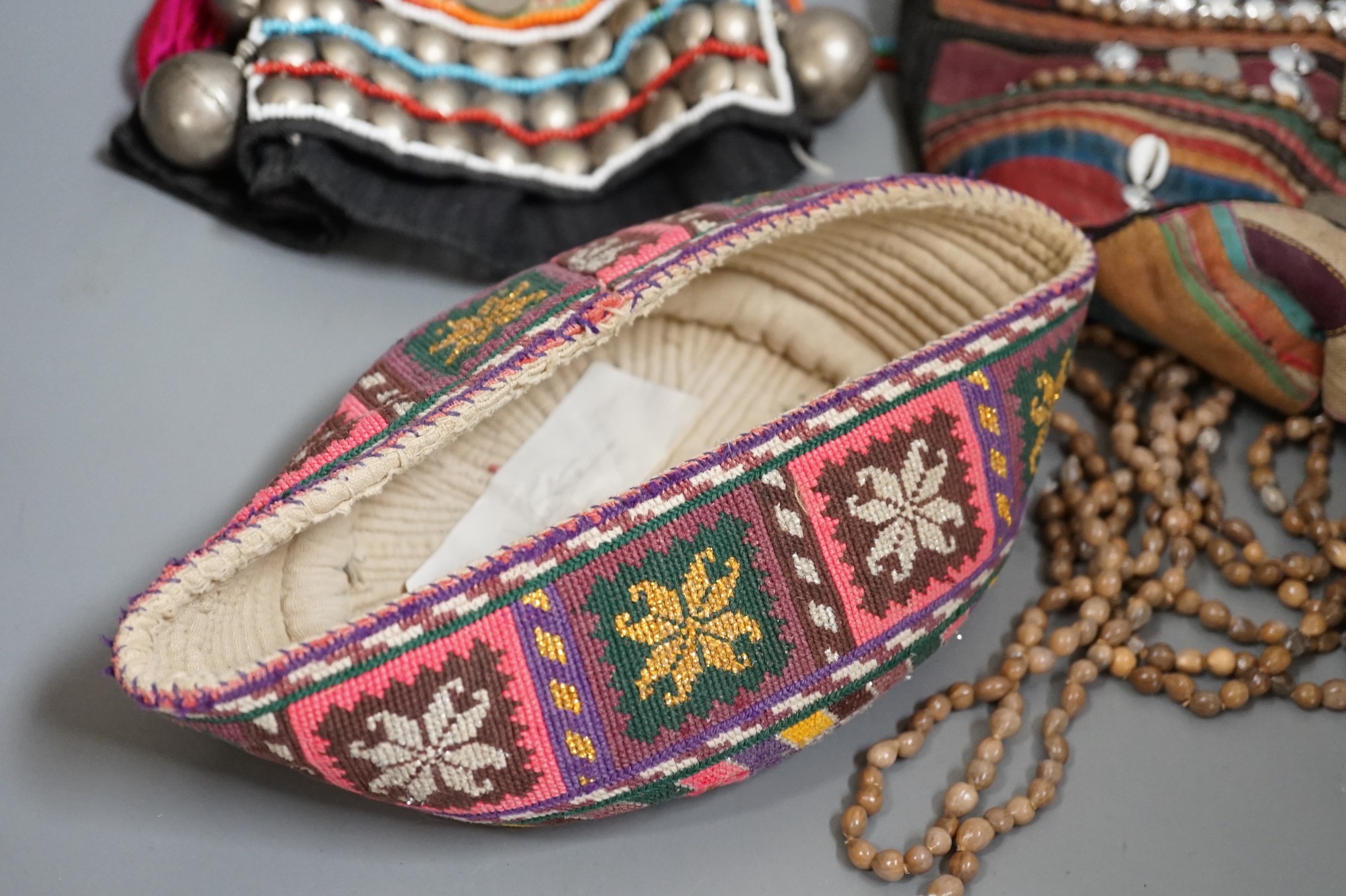 Two Thailand headdresses and an Afghan headdress